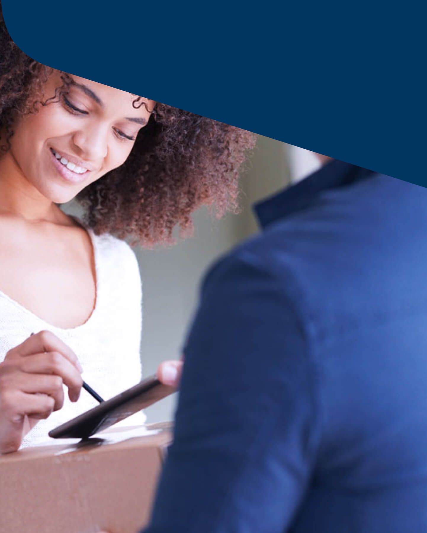 Woman signing for a package